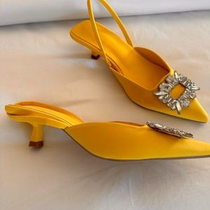 Yellow kitten heels with rhinestones